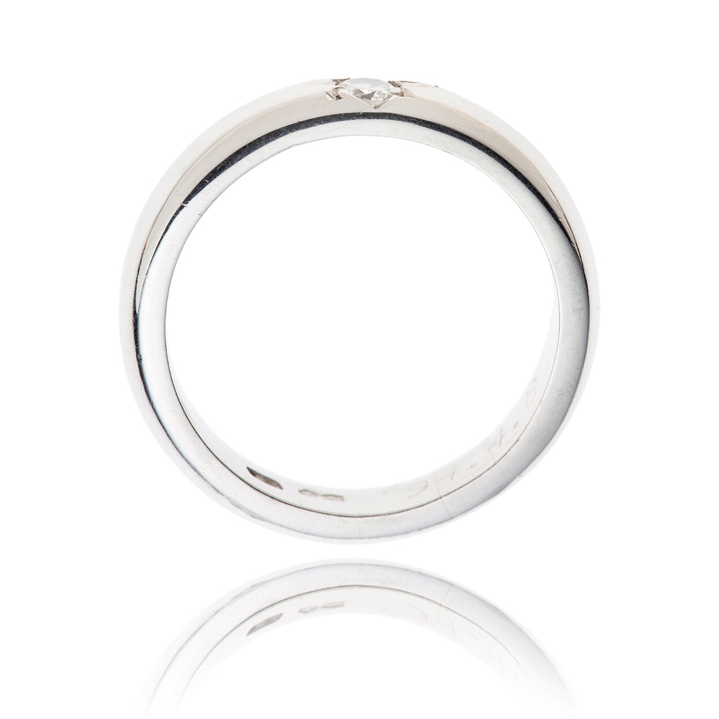 Platinum Tiffany Band Centered with a .15 Carat Diamond Default Title